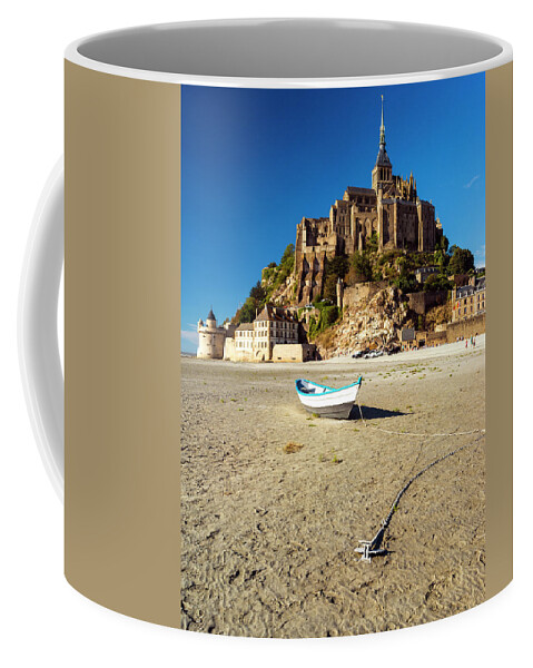 Abbey Coffee Mug featuring the photograph Le Mont Saint-Michel at Low tide. by John Paul Cullen