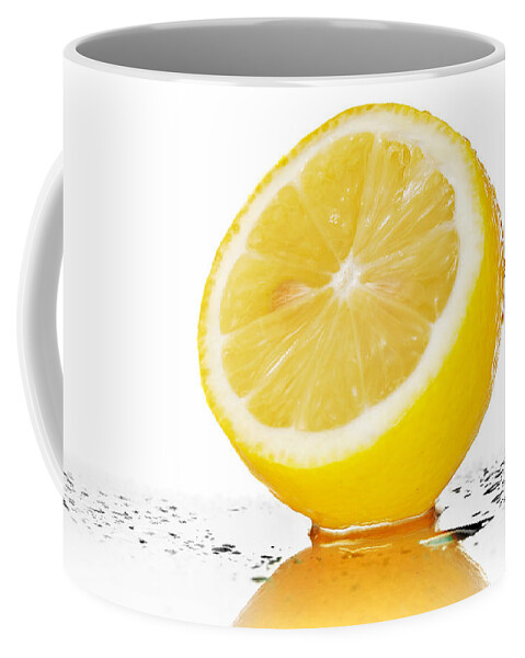 Lemon Coffee Mug featuring the photograph Lemon by Jackie Russo