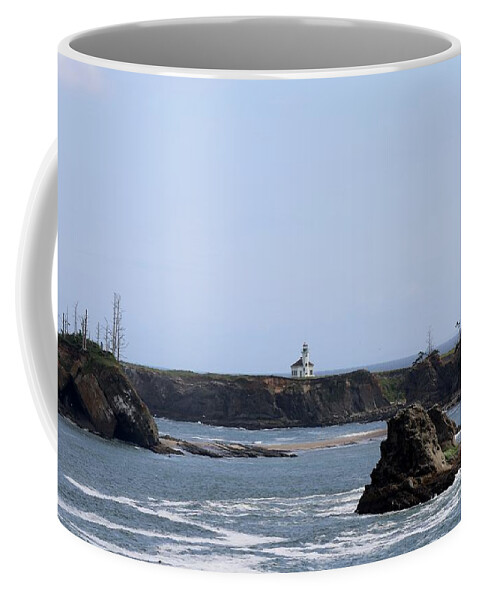 Lighthouse Coffee Mug featuring the photograph Lighthouse on the Oregon Coast by Christy Pooschke
