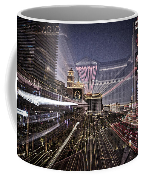 Las Vegas Coffee Mug featuring the photograph Lights on the Las Vegas Strip by Stuart Litoff