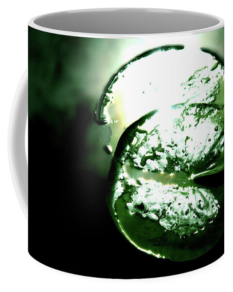 Green Coffee Mug featuring the photograph Lilypad Cosmos by Kreddible Trout