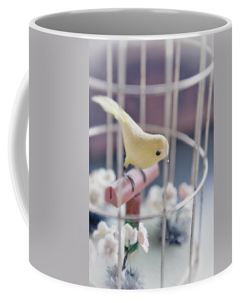Birdcage Coffee Mug featuring the photograph Little Yellow Bird by Caitlyn Grasso