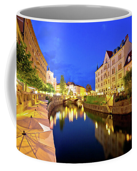 Ljubljana Coffee Mug featuring the photograph Ljubljanica river waterfront in Ljubljana evening view by Brch Photography