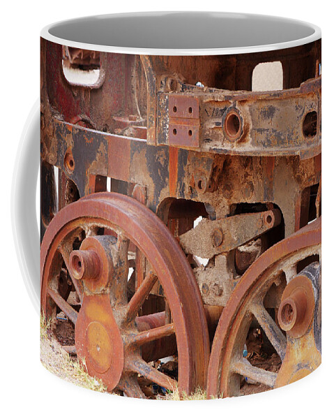 Rusty Coffee Mug featuring the photograph Locomotive In The Desert by Aidan Moran