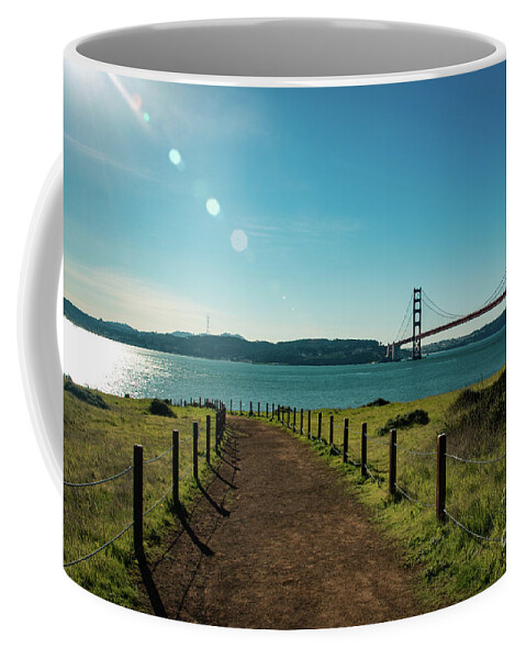 Bridge Coffee Mug featuring the photograph Lonely path with the golden gate bridge in the background by Amanda Mohler