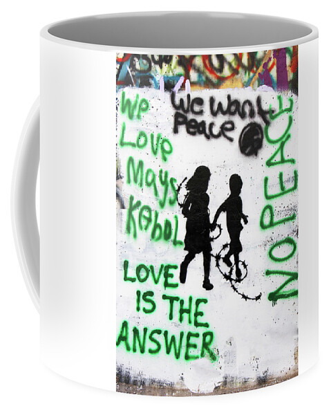 Love Coffee Mug featuring the photograph Love Is The Answer by Munir Alawi