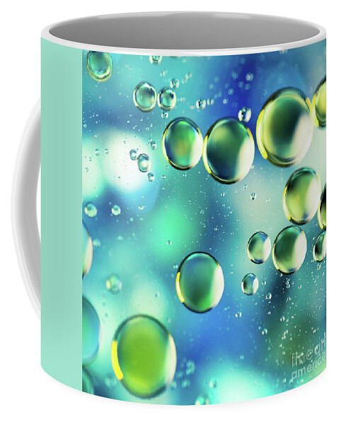 Macro Coffee Mug featuring the photograph Macro Water Droplets Aquamarine Soft Green Citron and Blue by Sharon Mau