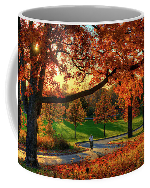 Biking Bicycle Madison Wi Wisconsin Autumn Fall Fall Colors Orange Biker Coffee Mug featuring the photograph Madison, Showing Off by Peter Herman