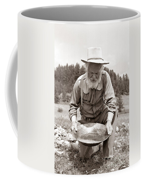 1849 Coffee Mug featuring the photograph Male Prospector Panning For Gold by H Armstrong Roberts and ClassicStock