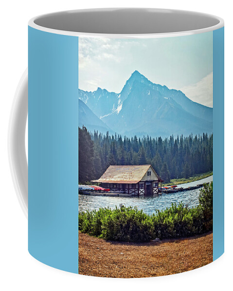 Boathouse Coffee Mug featuring the photograph Maligne Lake Boathouse by Catherine Reading