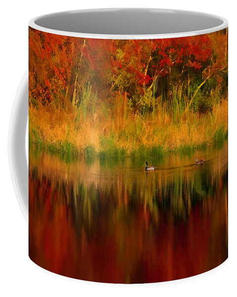 #jefffolger Coffee Mug featuring the photograph Mallards through reflection of fall colors by Jeff Folger