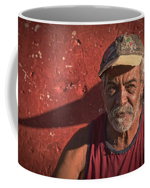 Joan Carroll Coffee Mug featuring the photograph Man in Trinidad Cuba by Joan Carroll