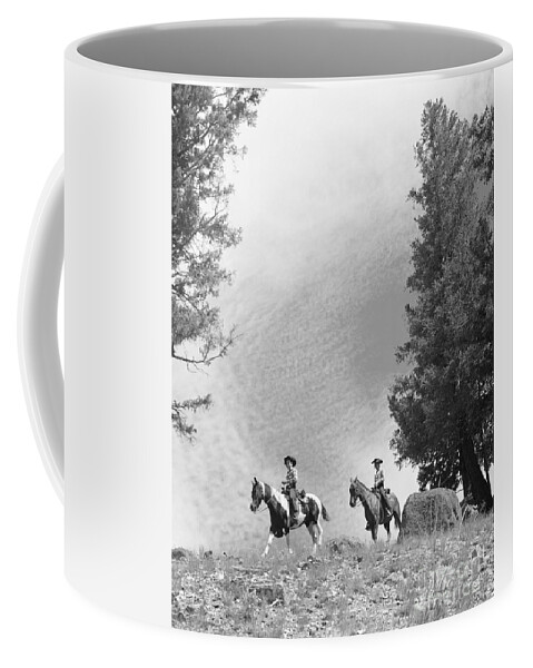 Adult Coffee Mug featuring the photograph Men Riding Horses, C.1950-60s by D. Corson/ClassicStock