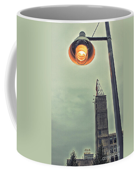 Minneapolis Coffee Mug featuring the photograph Mill District Lamplight by Becqi Sherman