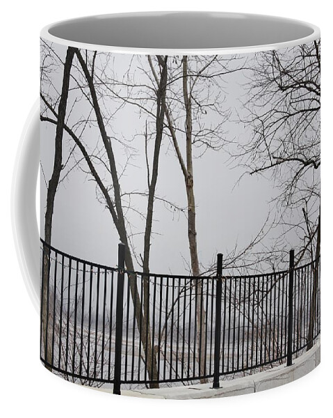 Glasgow Coffee Mug featuring the photograph Missouri River Fence by Kathryn Cornett