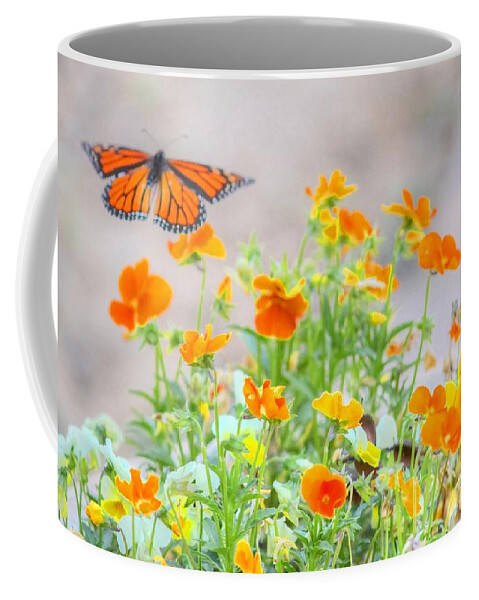 Butterfly Coffee Mug featuring the photograph Monarch Butterfly in the Flowers by Liz Vernand