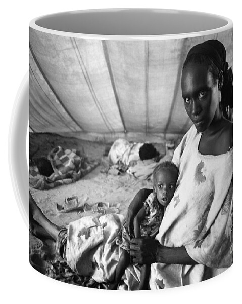 Mother Coffee Mug featuring the photograph Mother and Her Starving Child in a Tuberculosis Tent, African Diaspora by Wernher Krutein