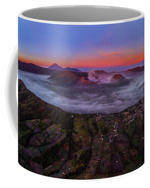 Travel Coffee Mug featuring the photograph Mount Bromo misty sunrise by Pradeep Raja Prints