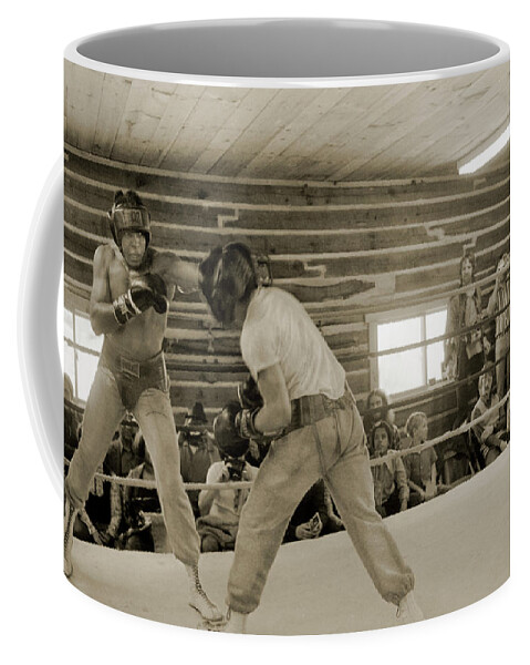 Boxing Coffee Mug featuring the photograph Muhammad Ali and Ernie Jones spar by Jan W Faul