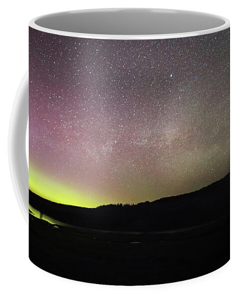 Aurora Coffee Mug featuring the photograph Northern Lights and Milky Way in Yellowstone NP by Jean Clark