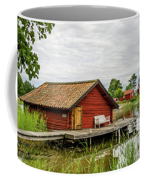 The Old Boathouse Coffee Mug featuring the photograph Old boathouse by Torbjorn Swenelius