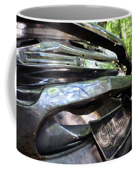 Oldsmobile Coffee Mug featuring the photograph Oldsmobile Bumper Detail by Matthew Mezo
