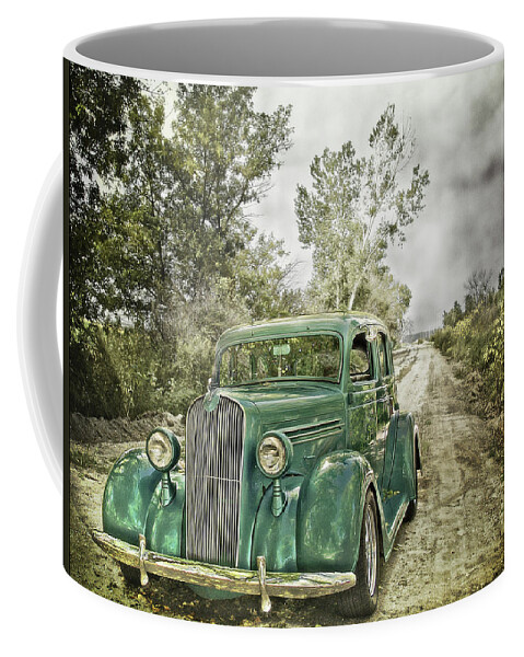 Cars Coffee Mug featuring the photograph On The River Road by John Anderson