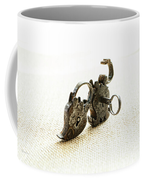 Sharon Popek Coffee Mug featuring the photograph One Open One Closed by Sharon Popek