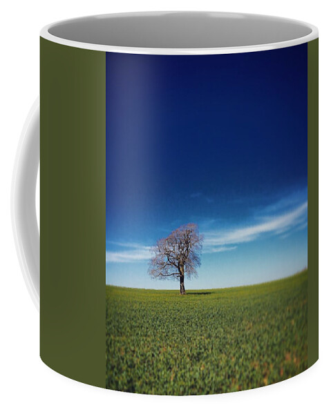 Britain Coffee Mug featuring the photograph One tree on the horizon by Seeables Visual Arts