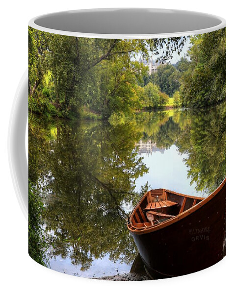 Lagoon Coffee Mug featuring the photograph Orvis Rowboat And Biltmore Reflection II by Carol Montoya