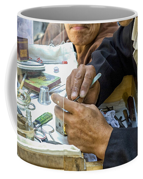 Asian Coffee Mug featuring the photograph Outdoor repair of clockwork by Patricia Hofmeester