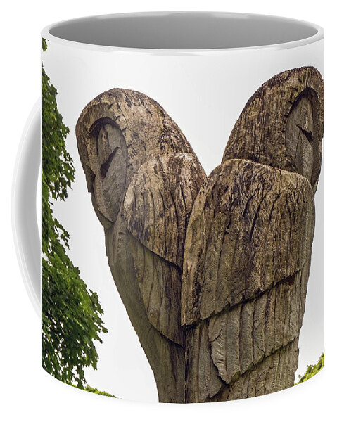 Carving Coffee Mug featuring the photograph Owl Wood Carvings by Jeff Townsend