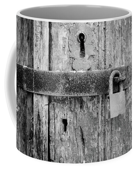 Padlock On An Old Wooden Door Coffee Mug featuring the photograph Padlock On An Old Wooden Door by Marco Oliveira