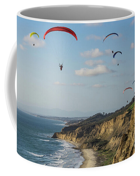 Beach Coffee Mug featuring the photograph Paragliders at Torrey Pines Gliderport Over Black's Beach by David Levin