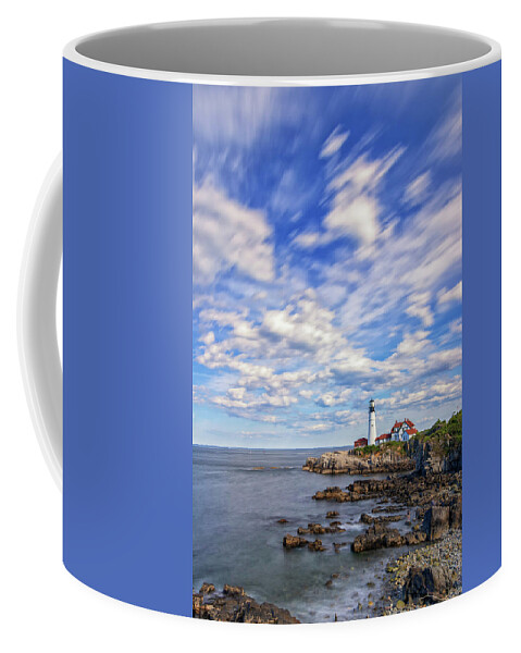 Portland Head Lighthouse Coffee Mug featuring the photograph Passing Clouds at Portland Head Light by Kristen Wilkinson
