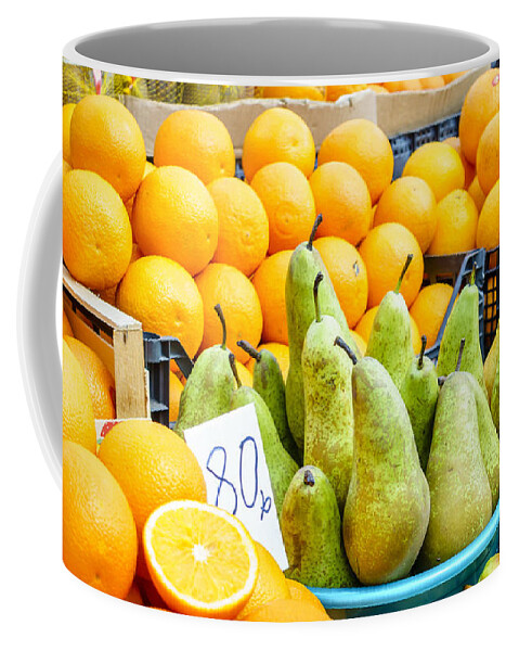 Pyatigorsk Coffee Mug featuring the photograph Pears and oranges by Alexey Stiop