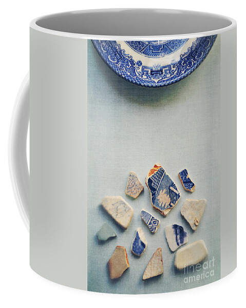 Photograph Coffee Mug featuring the photograph Picking up the broken pieces by Lyn Randle