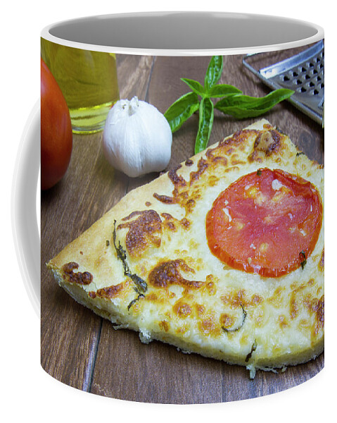 Baked Coffee Mug featuring the photograph Piece of Margarita pizza with ingredients by Karen Foley