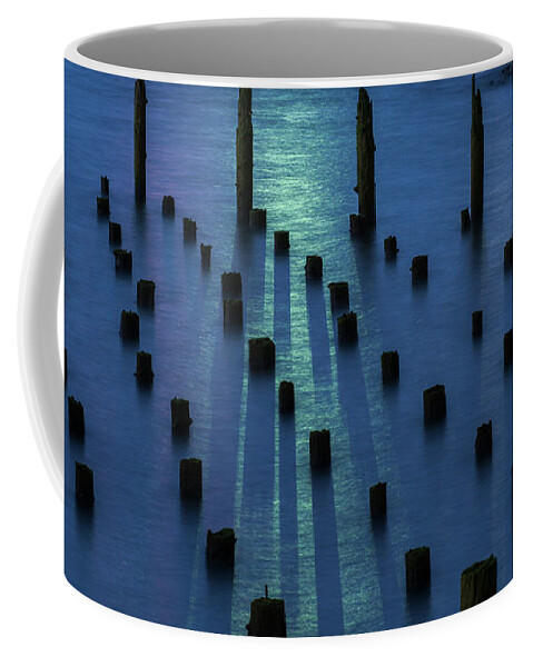 Abstract Coffee Mug featuring the photograph Pilings and Ship Light by Robert Potts