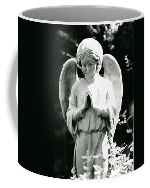 Angel Coffee Mug featuring the photograph Praying Angel Statue in Black and White by John Harmon