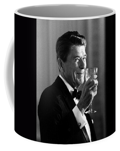 Ronald Reagan Coffee Mug featuring the painting President Reagan Making A Toast by War Is Hell Store