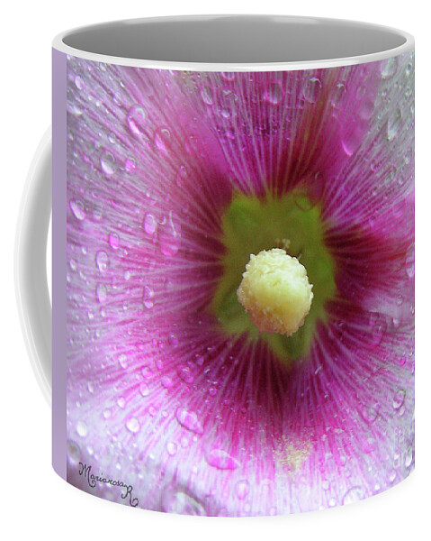 Flora Coffee Mug featuring the photograph Raindrops on Hollyhocks by Mariarosa Rockefeller