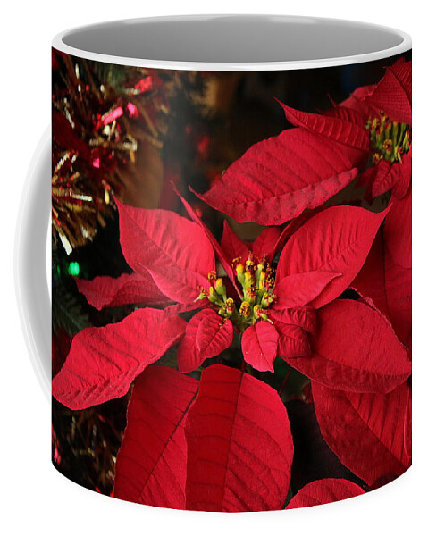 Red Coffee Mug featuring the photograph Red Poinsettia and Tinsel by Sheila Brown