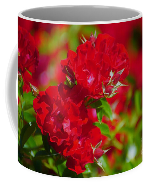 Red Coffee Mug featuring the photograph Red Roses by Merle Grenz
