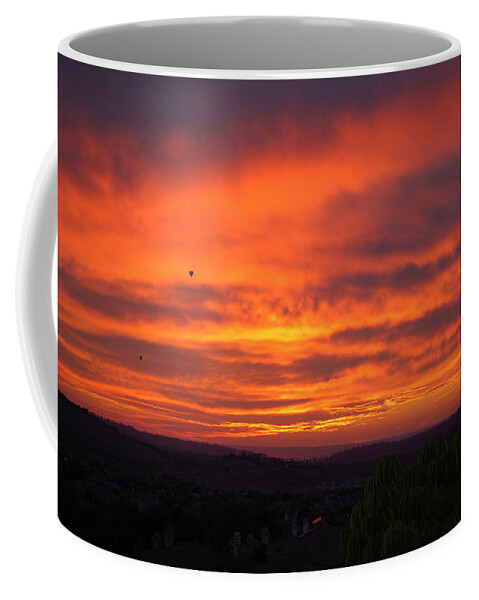 Red Coffee Mug featuring the photograph Reddish afternoon by Maria Aduke Alabi
