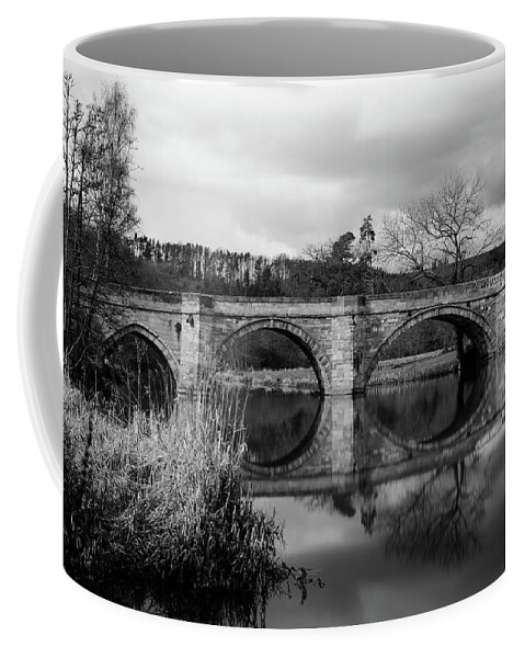 B & W Coffee Mug featuring the photograph Reflecting Oval Stone Bridge in Blanc and White by Dennis Dame