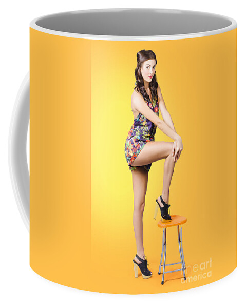 Woman Coffee Mug featuring the photograph Retro fashion image. Woman posing as a pin-up girl by Jorgo Photography