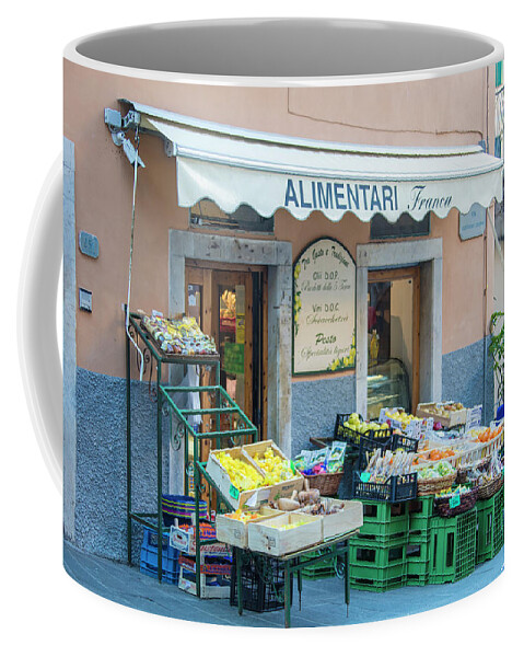 Canon Coffee Mug featuring the photograph Riogmaggiore Fruit Stand by John McGraw