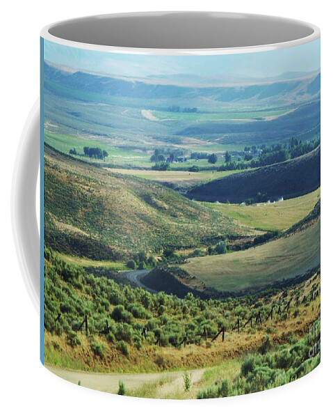 Landscape Coffee Mug featuring the photograph Road From The Blues by Julie Rauscher