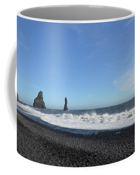 Reynisfjara-beach Coffee Mug featuring the photograph Rock Formations off the Coast of Reynisfjara Beach in Vik Icelan by DejaVu Designs